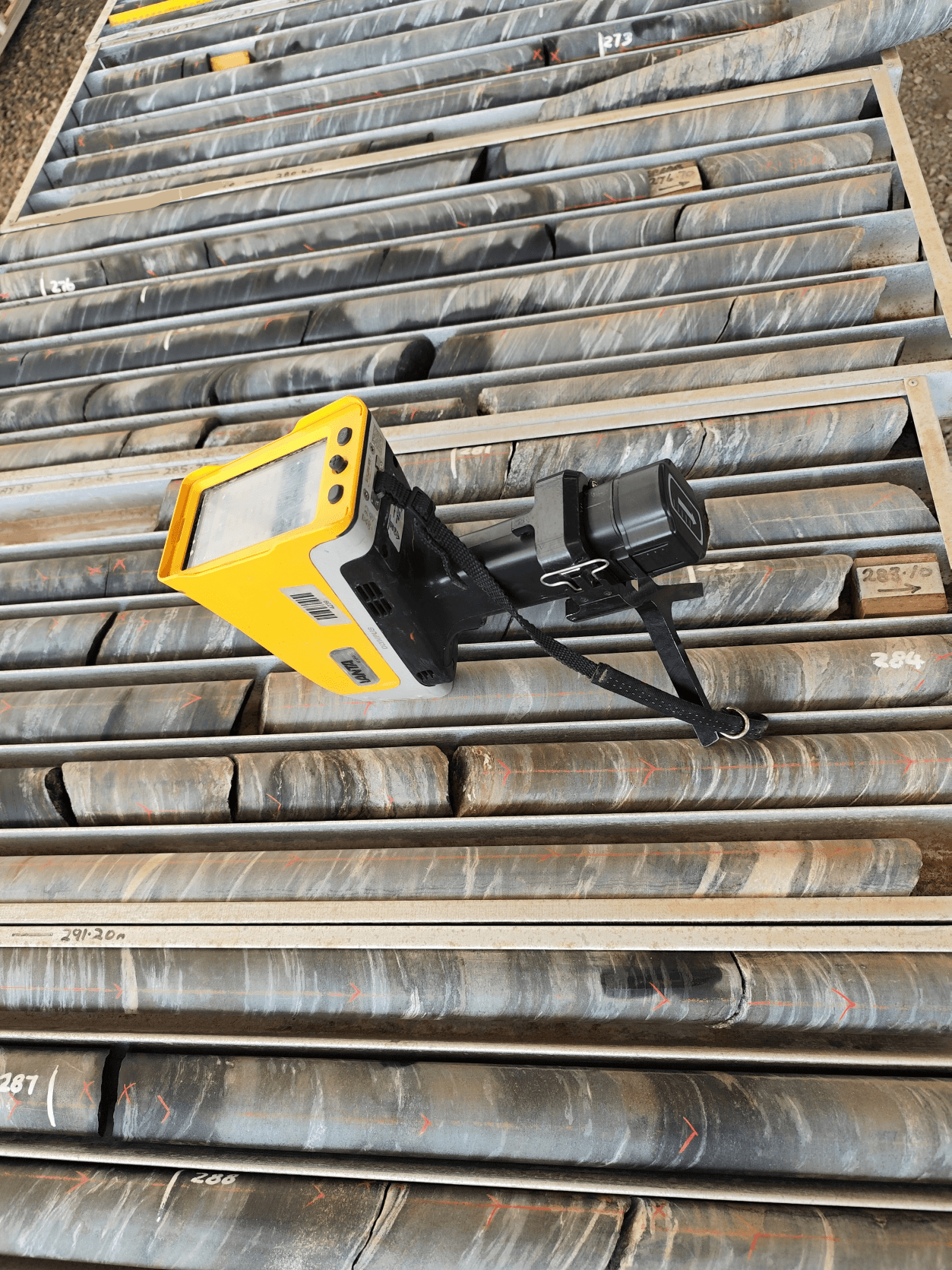 Olympus pXRF instrument scanning drill core samples